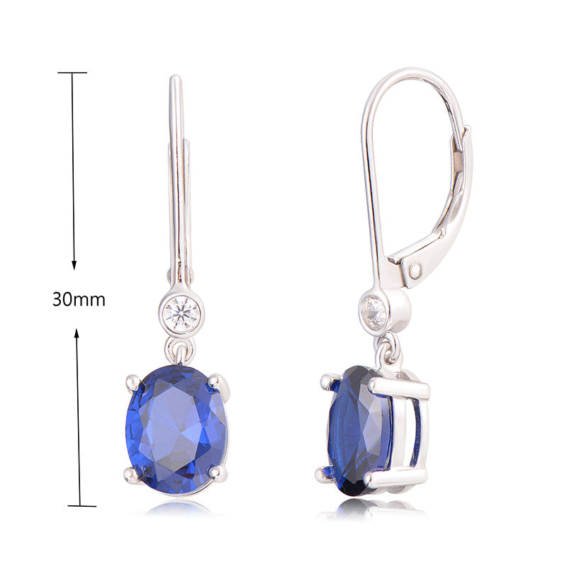 J&T STG Oval 7*9mm Blue Sapphire CZ  White CZ Earring