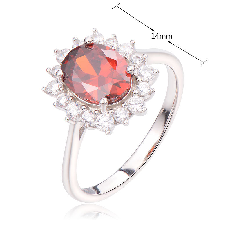 J&T STG  Oval 7*9mm Red CZ White Ring